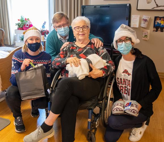 There's magic in seeing strangers come together: Volunteer elves deliver holiday cheer to Bow View Manor residents
